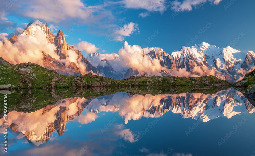 Sunset panorama of the Lac Blanc lake with Mont Blanc (Monte Bianco) on background, Chamonix location. Beautiful outdoor scene in Vallon de Berard Nature Reserve, France
