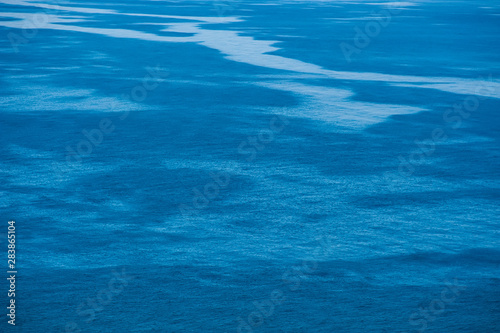 surface of the water in the sea on a sunny day.