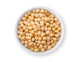 Soybeans in bowl on white background.