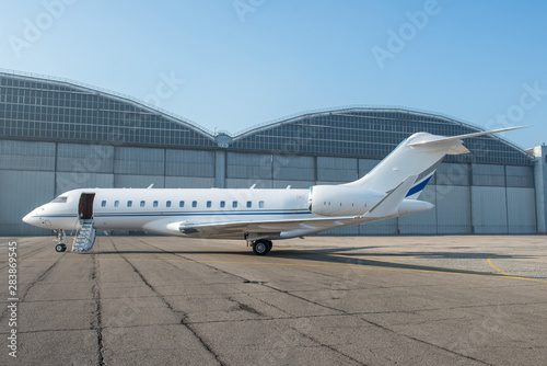 Business jet plane on the ground.