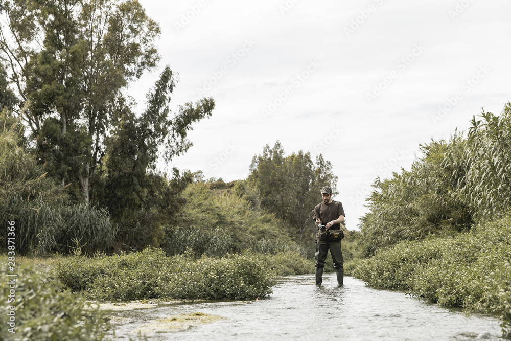 Man fishing at the river