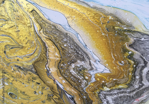 Abstract images from acrylic paint splashed onto canvas background images.