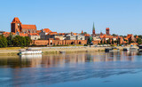 Panoramic view of Torun city and Wisla (Vistula) river in sunny day. Poland, summer 2019