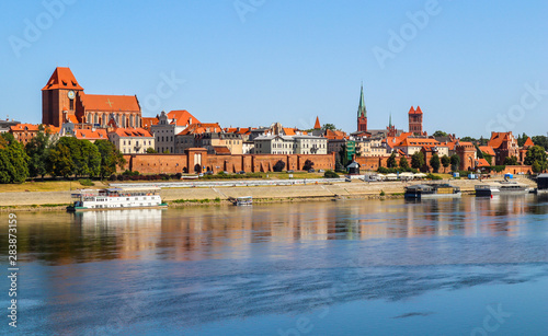 Panoramic view of Torun city and Wisla (Vistula) river in sunny day. Poland, summer 2019