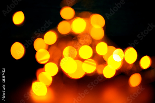 Light bokeh background, new year concept coral color