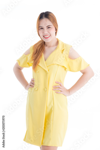 Beautiful asian woman smiling and looking at camera over white background