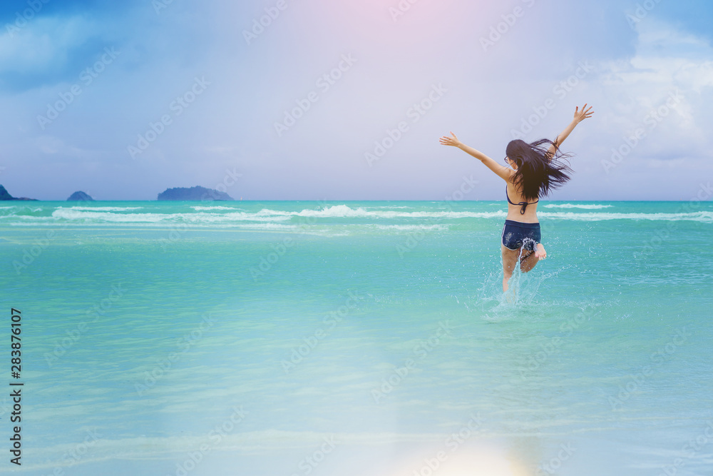 Sexy woman freedom vacation relax running in to the sea. Sexy woman freedom vacation relax running in to the sea.