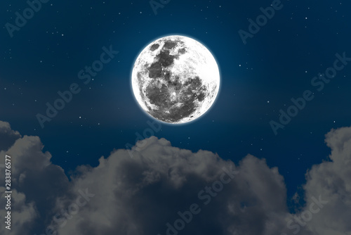 Bright moon in the sky with blurred cloud and little star.