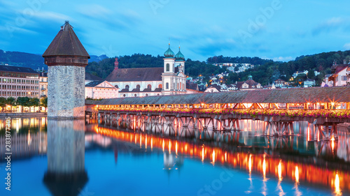 Sunrise in historic city center of Lucerne with famous Chapel Bridge and lake Lucerne  Vierwaldstattersee   Switzerland