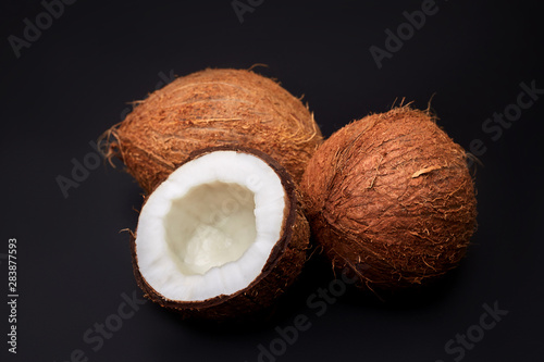 coconuts isolated on black