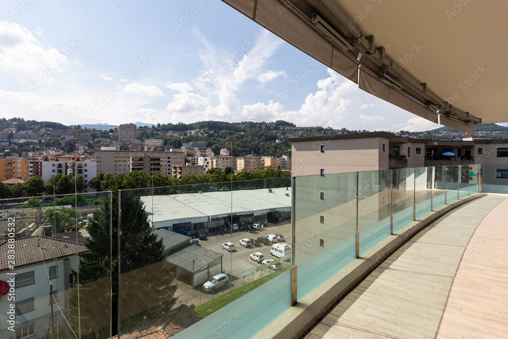 Luxury apartment balcony with city view