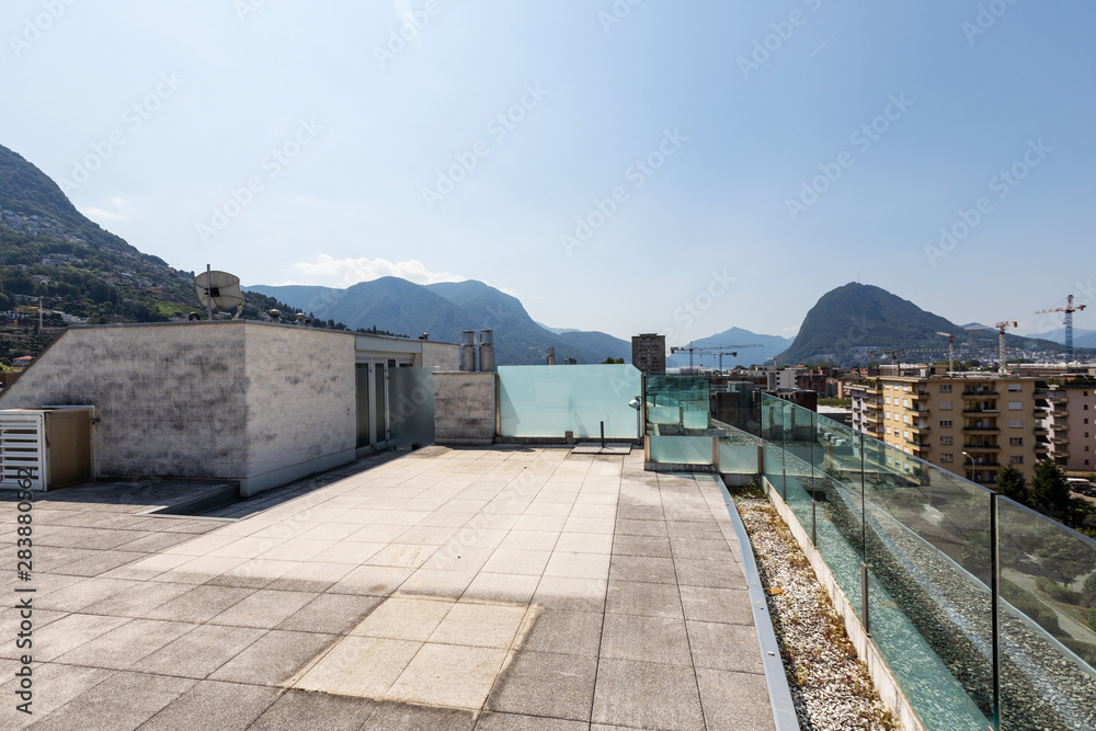 Private terrace with city and mountain views