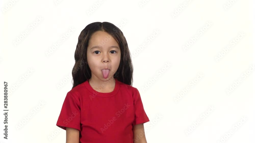 Pretty little woman smile, have fun and shows a tongue. Slow motion Pretty little woman smile, have fun and shows a tongue. Slow motion