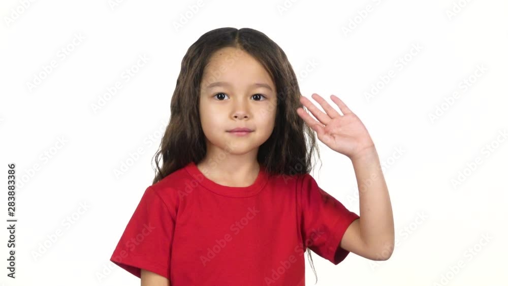 Little girl waving with hand on white background. Slow motion Little girl waving with hand on white background. Slow motion