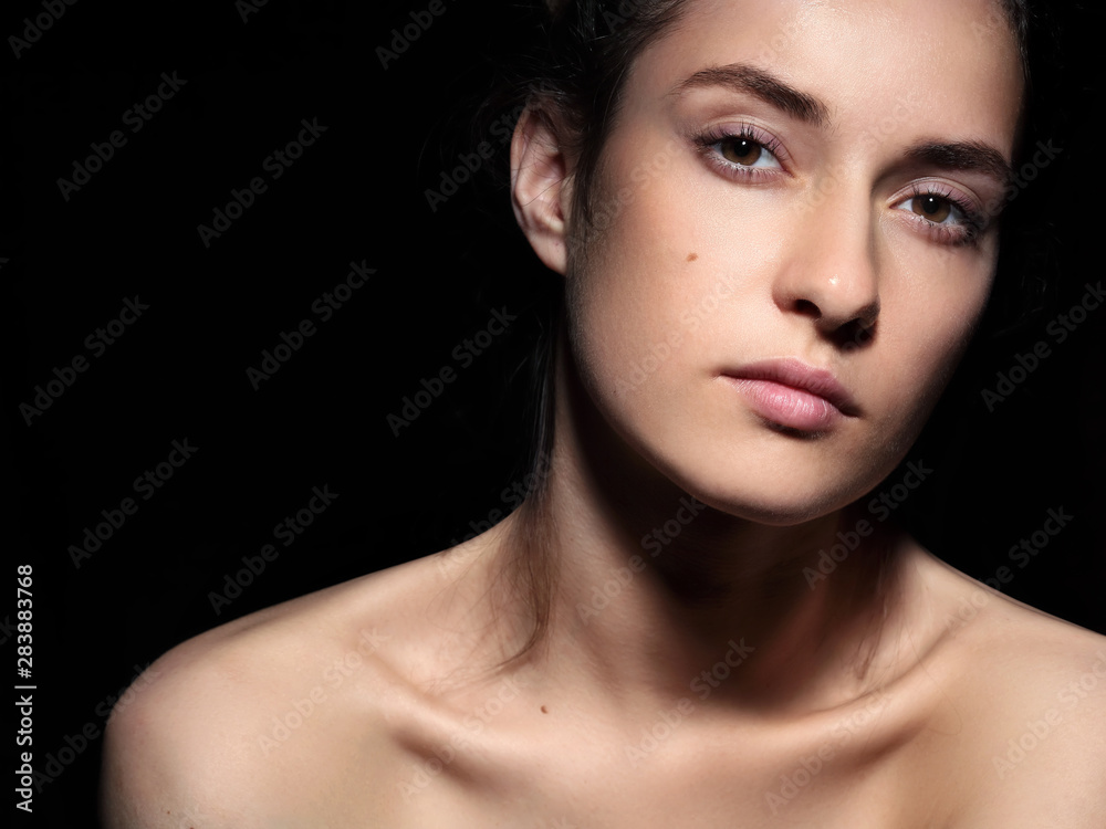 Beauty portrait.Young gorgeous girl .Beautiful .Girl.Close-up fashion.Black background