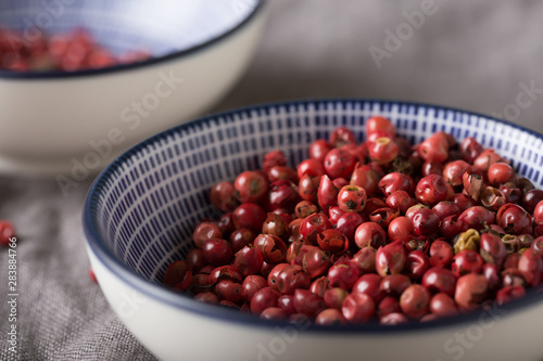 Close-up of pink pepper in a bowl