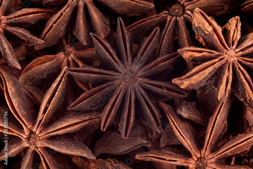 Anise star seeds background texture, copy space, close up. Top view, flat lay
