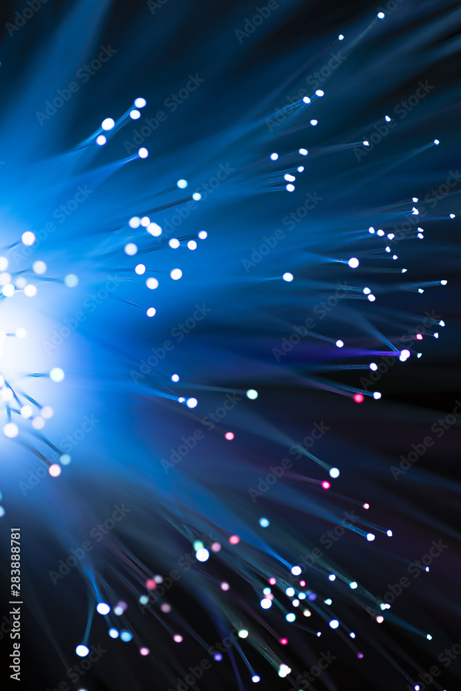 Fototapeta premium Glowing fiber channels in blue shades