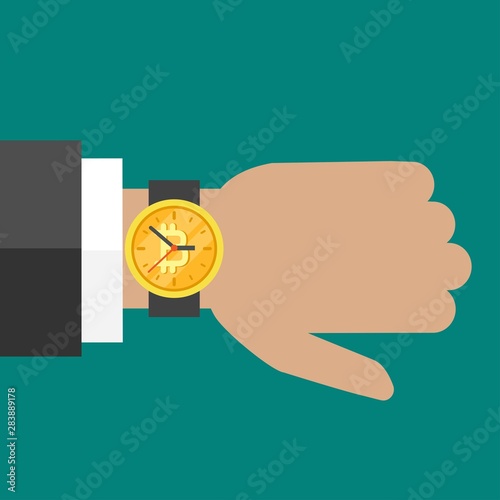 Hand with golden hand watch on wrist with bitcoin sign on turquoise background.