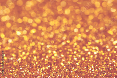 Red golden festive background with sparkles in the bokeh