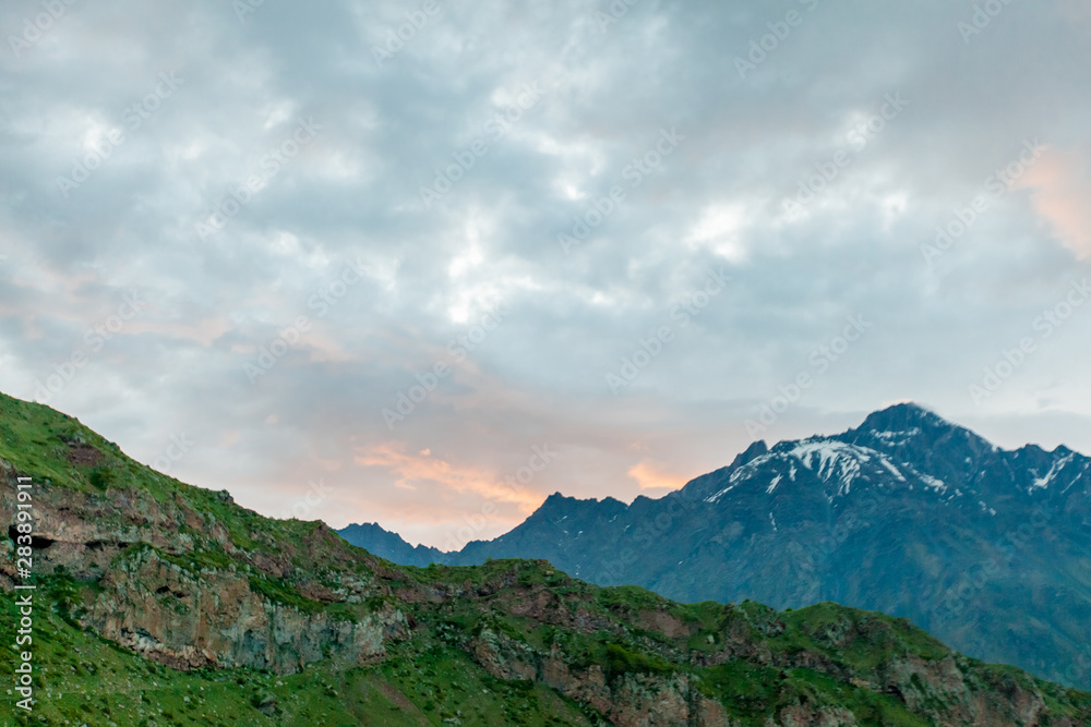 Mountains rocks landscape with cloudy dramatic sky Mountains rocks landscape with cloudy dramatic sky
