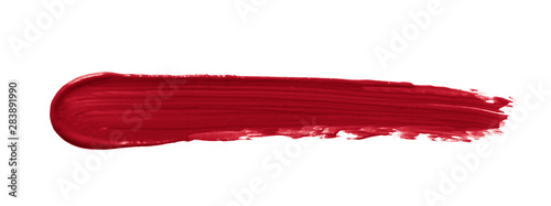 Lipstick smear smudge swatch isolated on white background. Creamy makeup texture. Red color cosmetic product brush stroke swipe sample