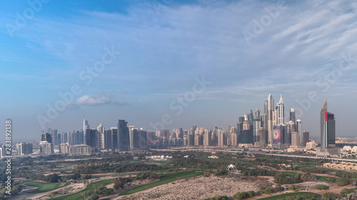Dubai Marina skyscrapers and golf course morning timelapse  Dubai  United Arab Emirates
