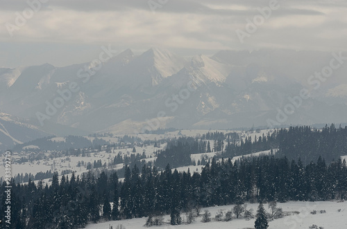 Misty mountains in winter - Tatra mountains in Poland.