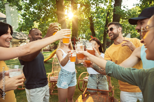 Photography Group of happy friends having beer and barbecue party at sunny day