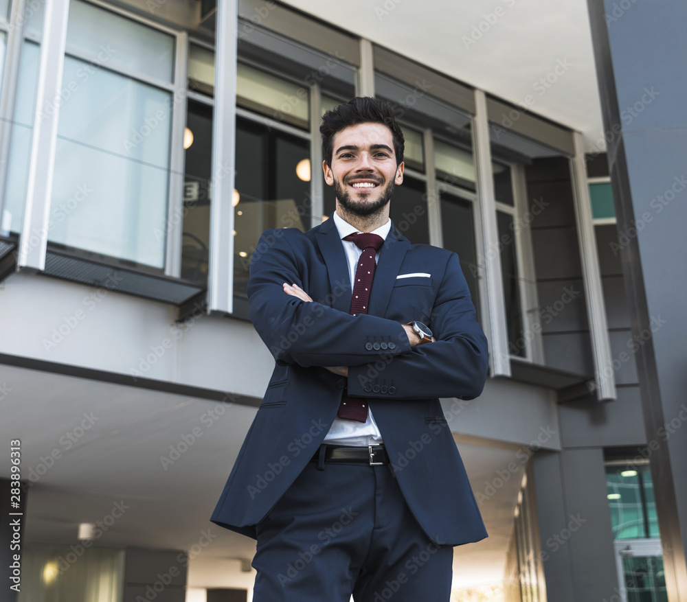 Medium shot smiley man with crossed arms