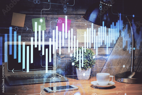 Multi exposure of forex chart and work space with computer. Concept of international online trading. © peshkova