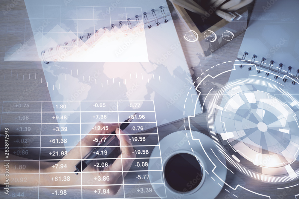 Multi exposure of woman's hands making notes with forex graph hologram. Concept of technical analysis. Multi exposure of woman's hands making notes with forex graph hologram. Concept of technical analysis.