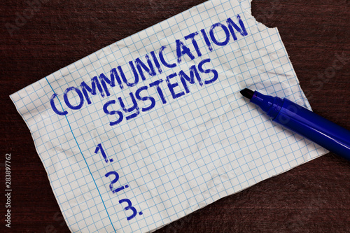 Writing note showing Communication Systems. Business photo showcasing Flow of Information use of Machine to transmit signals Squared notebook paper Markers Communicating ideas Expressing feelings