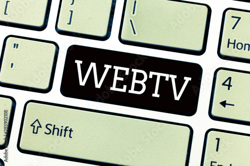 Text sign showing Webtv. Conceptual photo Internet transmission programs produced both online and traditional. photo