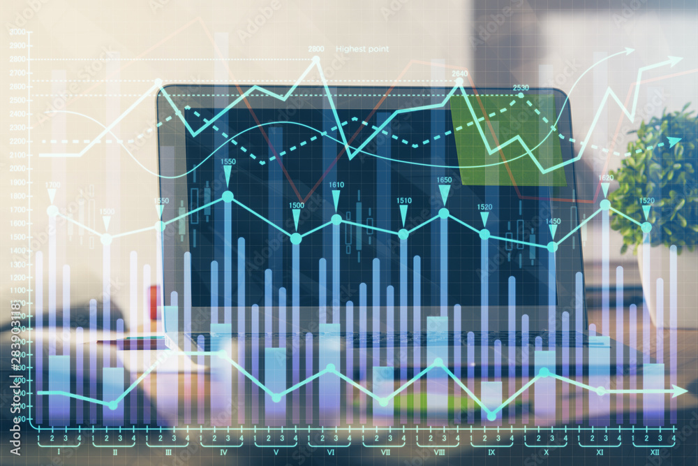 Financial market graph hologram and personal computer on background. Multi exposure. Concept of forex. Financial market graph hologram and personal computer on background. Multi exposure. Concept of forex.