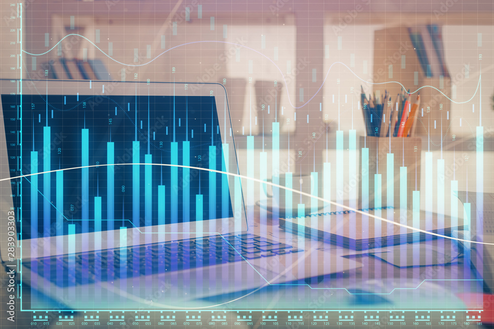 Financial market graph hologram and personal computer on background. Double exposure. Concept of forex. Financial market graph hologram and personal computer on background. Double exposure. Concept of forex.