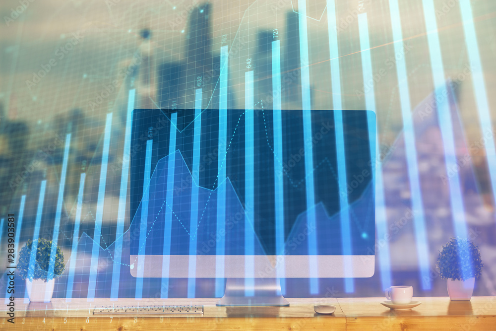 Stock market chart hologram drawn on personal computer background. Multi exposure. Concept of investment.