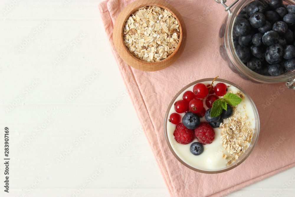 yogurt with berries on the table. yogurt with berries on the table.