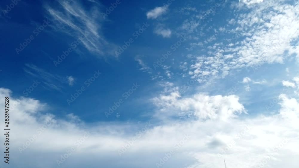 timelapse of blue sky with cloudy before raining ,BUILDING MOTION CLOUD WITH BLUE SKY. Puffy fluffy white clouds blue sky time lapse move cloud background Blue clouds sky time lapse 