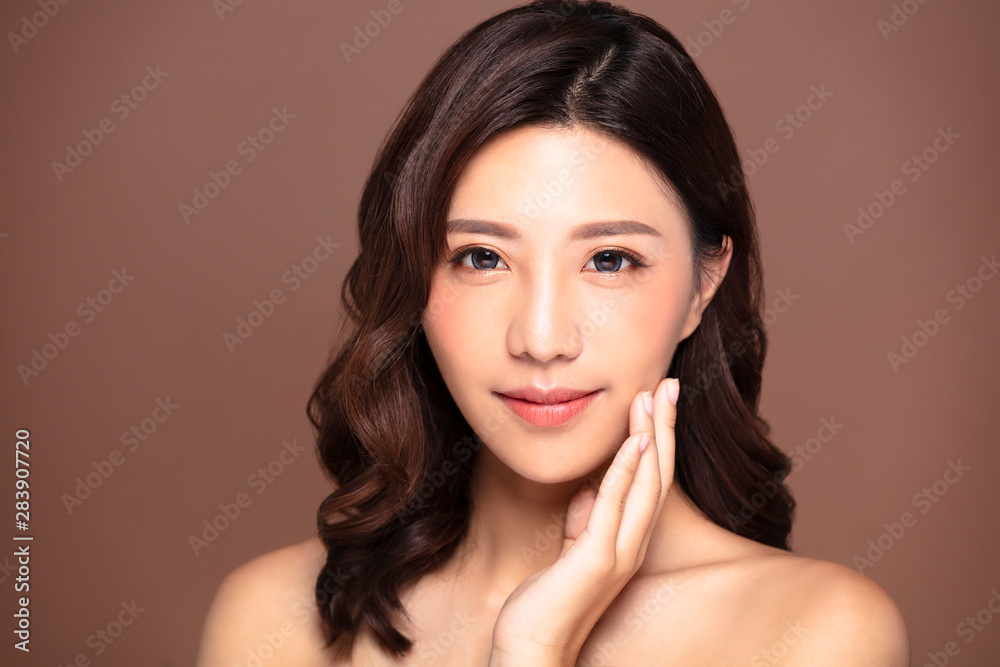 Beautiful young woman with natural makeup and clean skin Beautiful young woman with natural makeup and clean skin
