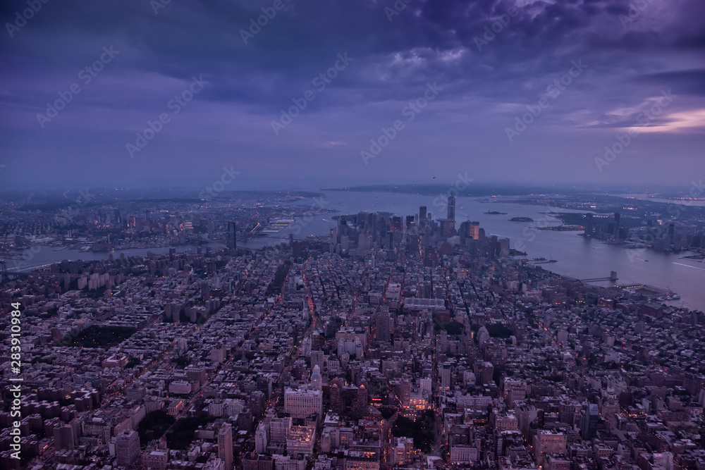 Aerial view of New York city. Dark photo in the evening.