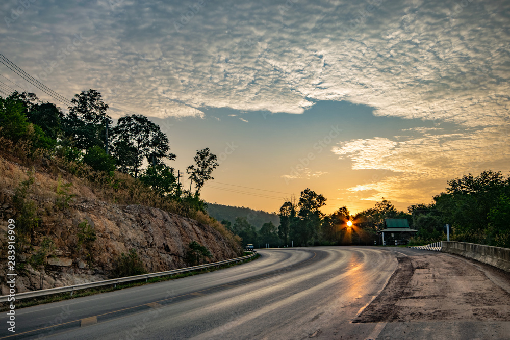 Road view with sunrise on the morning