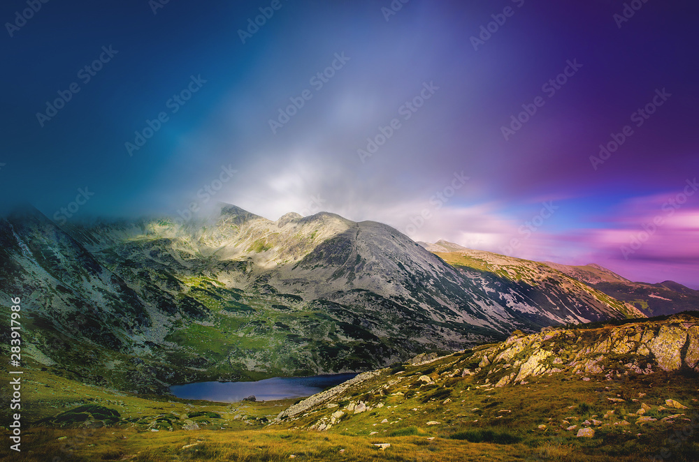 Mountain landscape and glacial Bucura lake in Retezat National Park, Carpathian Mountains, Romania