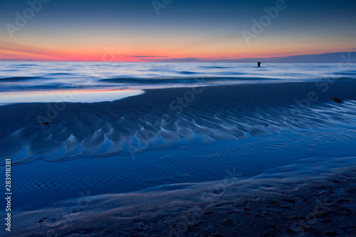 Bałtycka plaża zachód słońca