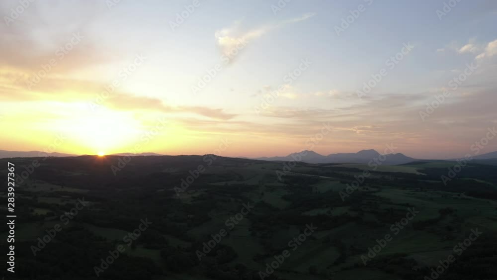 Purple sky and sun before sunset over Deli Jovan Stol and Veliki Krs mountains 4K drone video Purple sky and sun before sunset over Deli Jovan Stol and Veliki Krs mountains 4K drone video