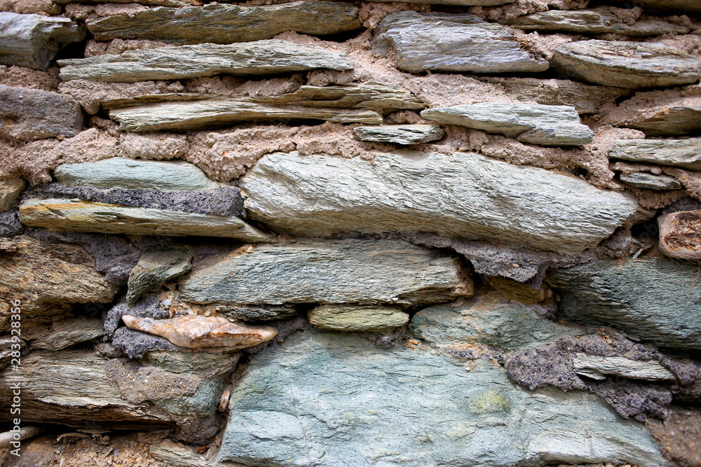 Background texture of rough cliff rock wall Background texture of rough cliff rock wall