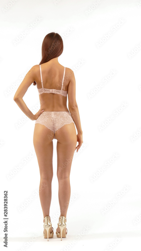 Woman In beige Lingerie Isolated On white Woman In beige Lingerie Isolated On white