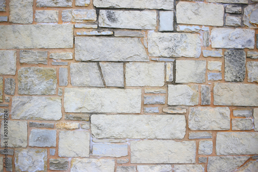 Fototapeta premium Stone wall texture background, facade