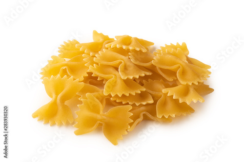 Group of yellow Farfalle shape of italian pasta on white background isolated