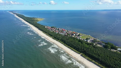 Beach in beautiful city Chalupy resort in Poland. Aerial video. Baltic Sea.Waves coming in. photo